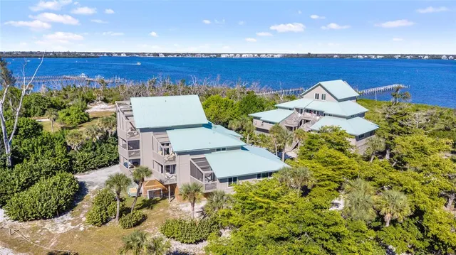 an aerial view of a house with a garden