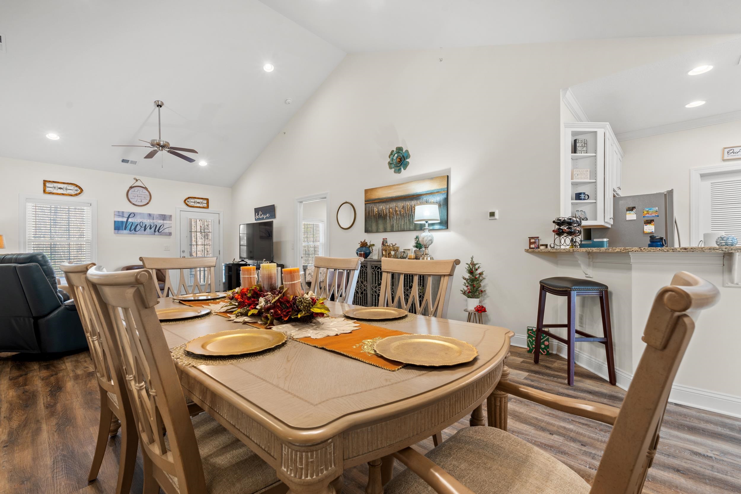 900 Jackline Place, Unit 202 Columbia, SC 29209 - Photo 20 of 39 Dining room featuring dark wood-style floors, recessed lighting, ceiling fan, and high vaulted ceiling