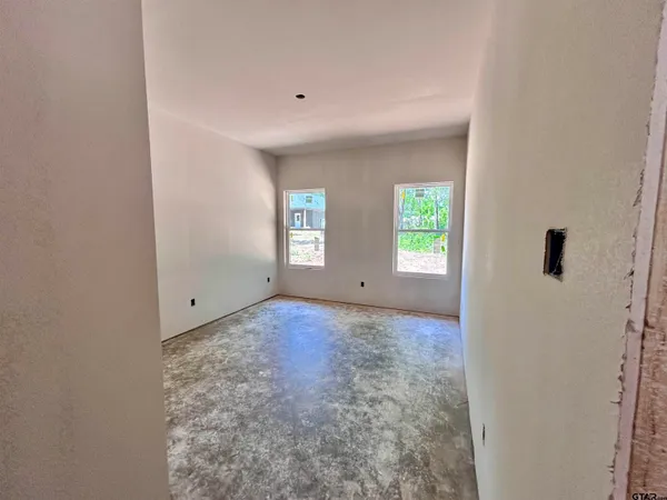 a view of a room that has a window in it