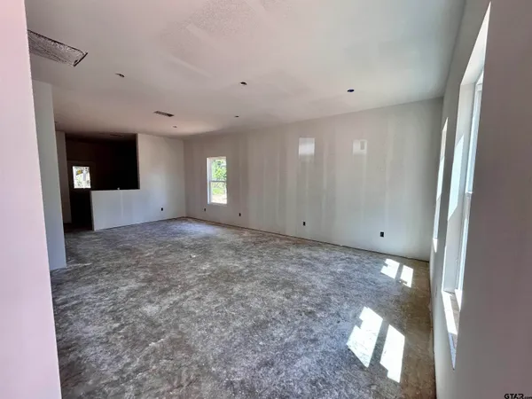 a view of a windows and an empty room