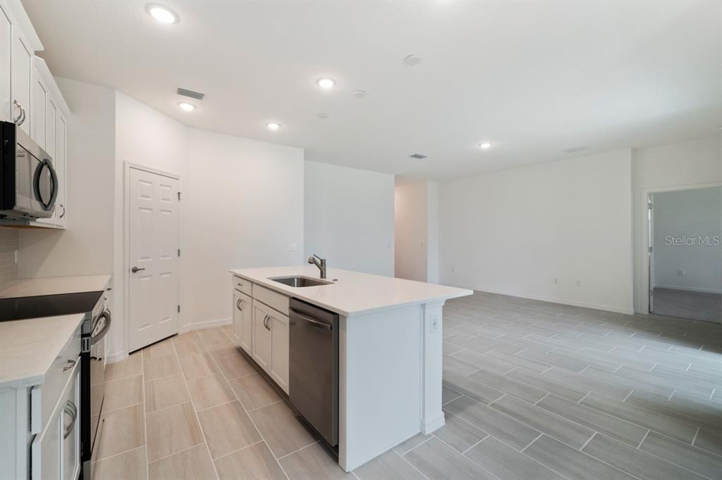 5942 Vision Road St. Cloud, FL 34771 - Photo 4 of 11 Kitchen / Great Rm