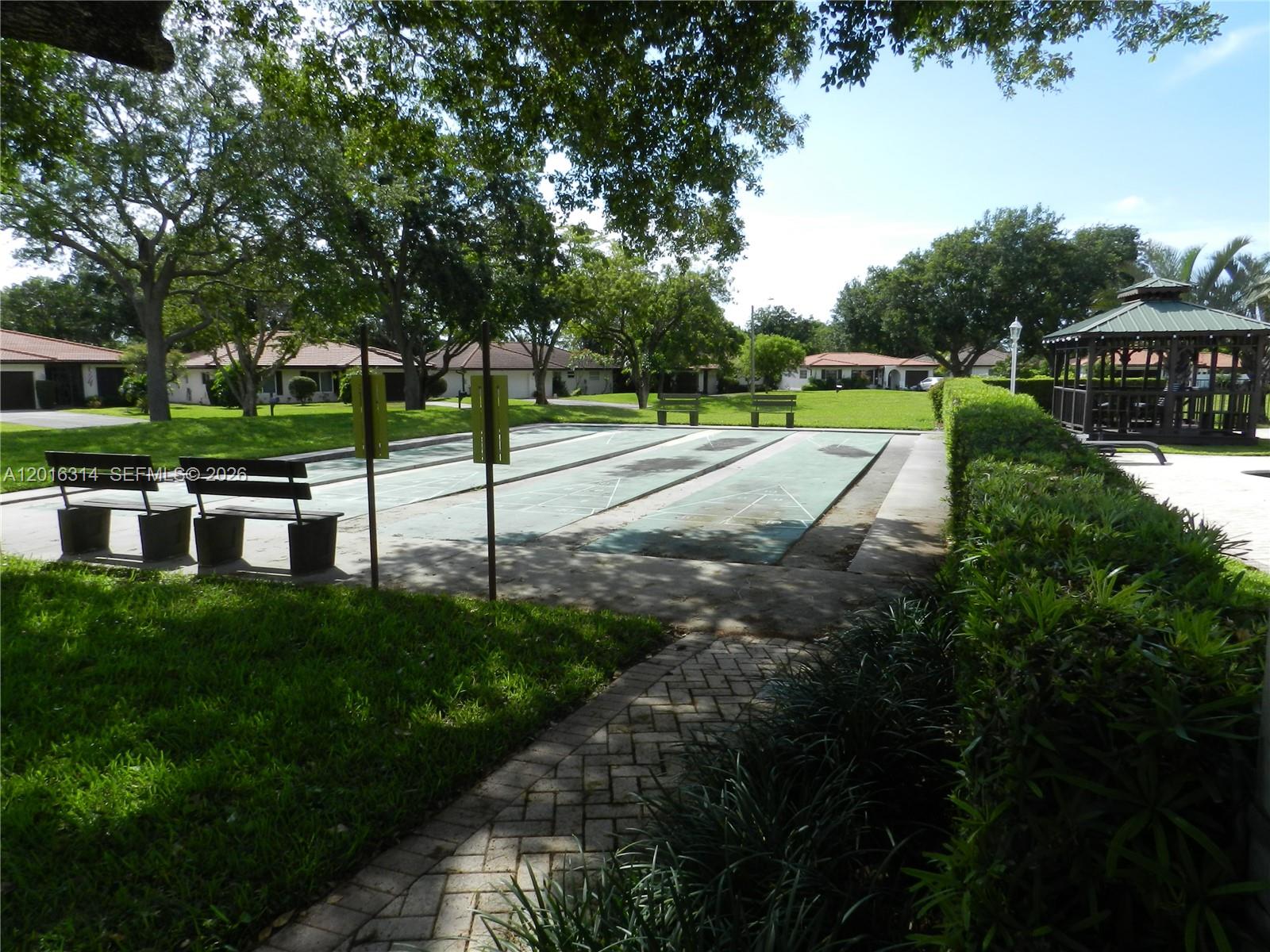305 Northwest 42nd Street Boca Raton, FL 33431 - Photo 28 of 31 a view of a park with plants and trees