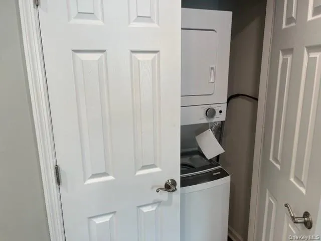 a bathroom with a granite countertop sink