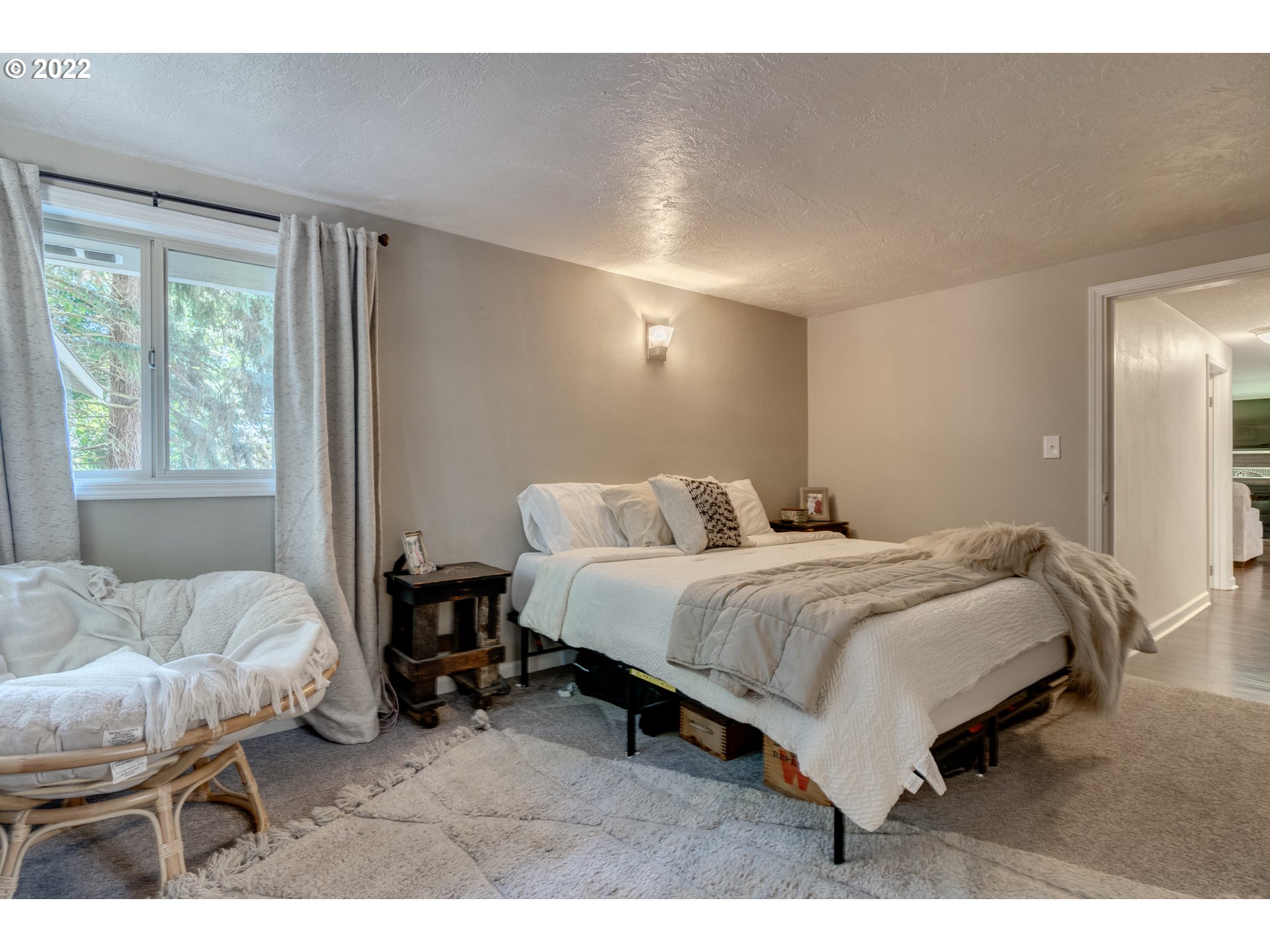 3405 Northeast Corbin Road Vancouver, WA 98686 - Photo 16 of 30 a bed room with a bed and a chair