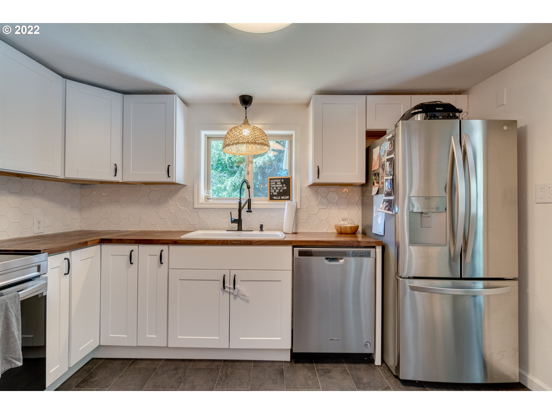 3405 Northeast Corbin Road Vancouver, WA 98686 - Photo 7 of 30 a kitchen with stainless steel appliances a refrigerator sink and cabinets