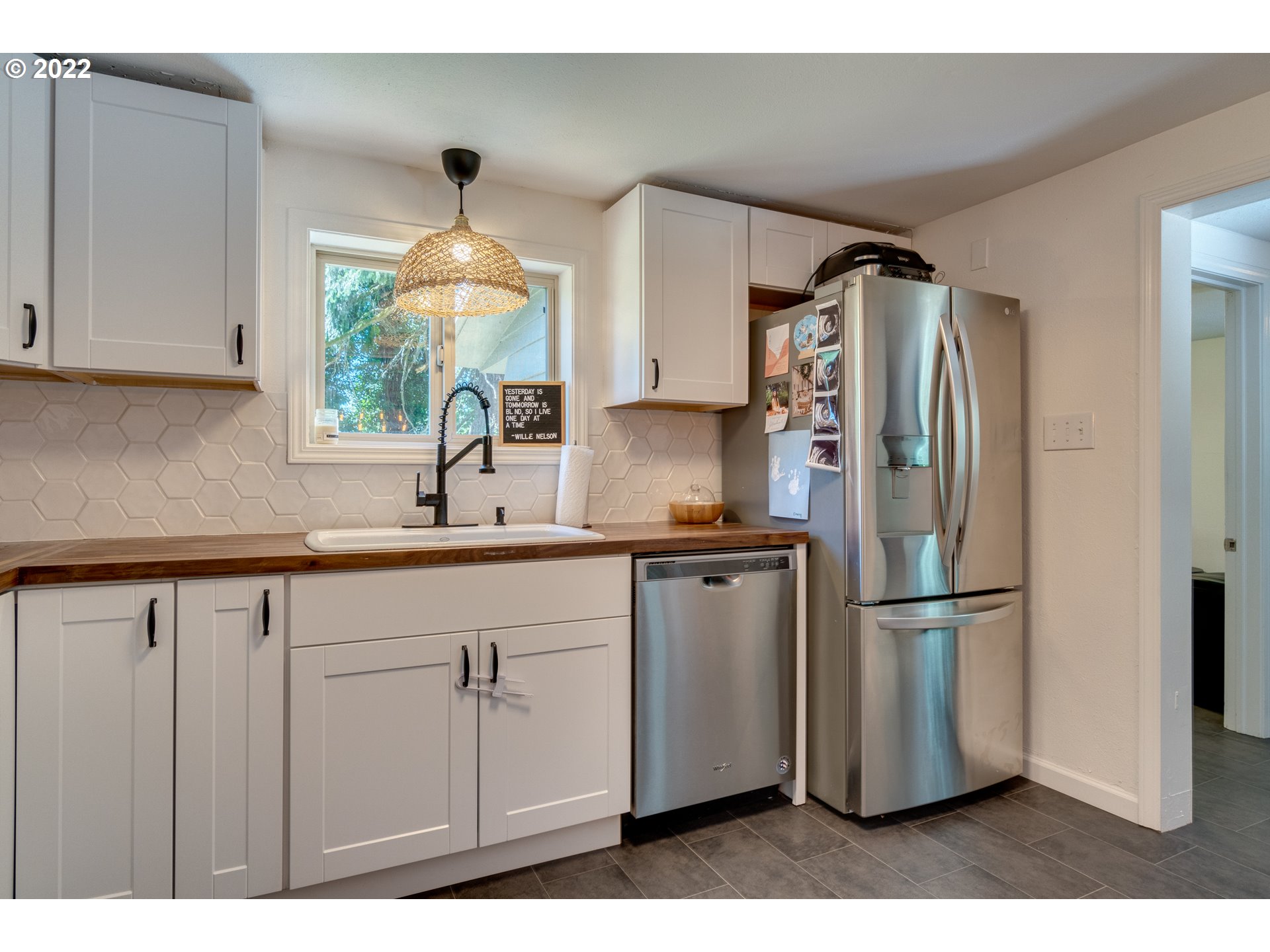 3405 Northeast Corbin Road Vancouver, WA 98686 - Photo 8 of 30 a kitchen with a refrigerator and a sink
