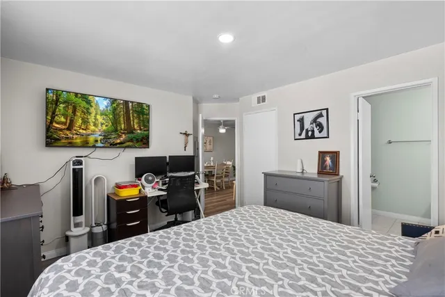 a bedroom with a bed and furniture