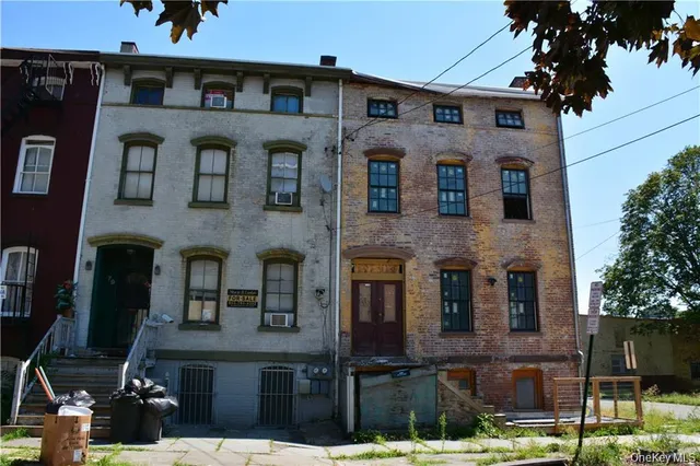 a front view of a building with balcony