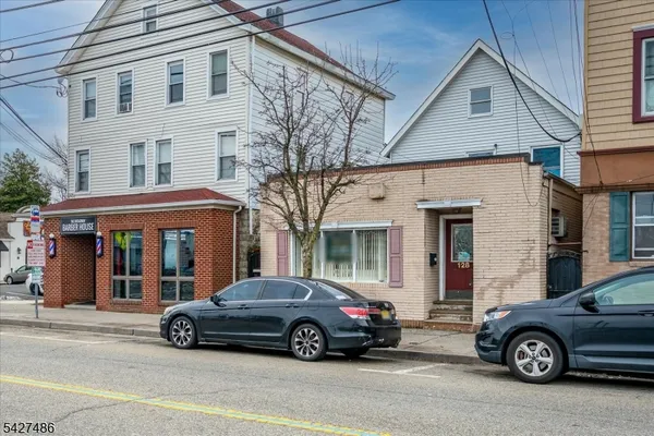 a car parked in front of a house