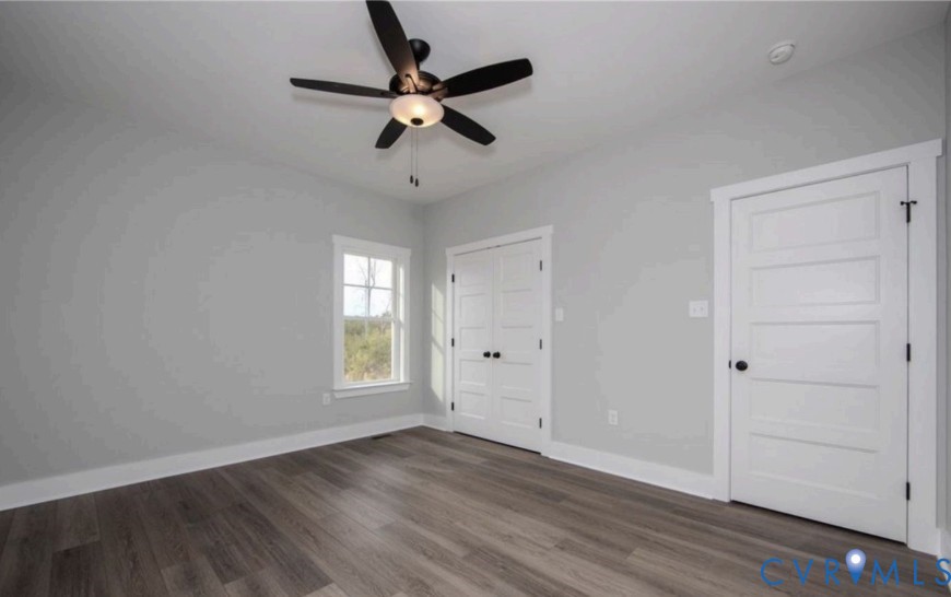 115 Jenkins Church Road Cumberland, VA 23040 - Photo 11 of 16 Wood-finish flooring, ceiling fan with integrated