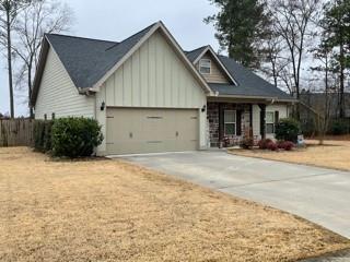 39 Round Rock Circle Northeast Rome, GA 30161 - Photo 1 of 1 front view of a house with a trees