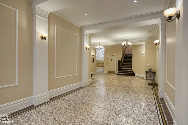 workspace with wooden floor staircase and windows
