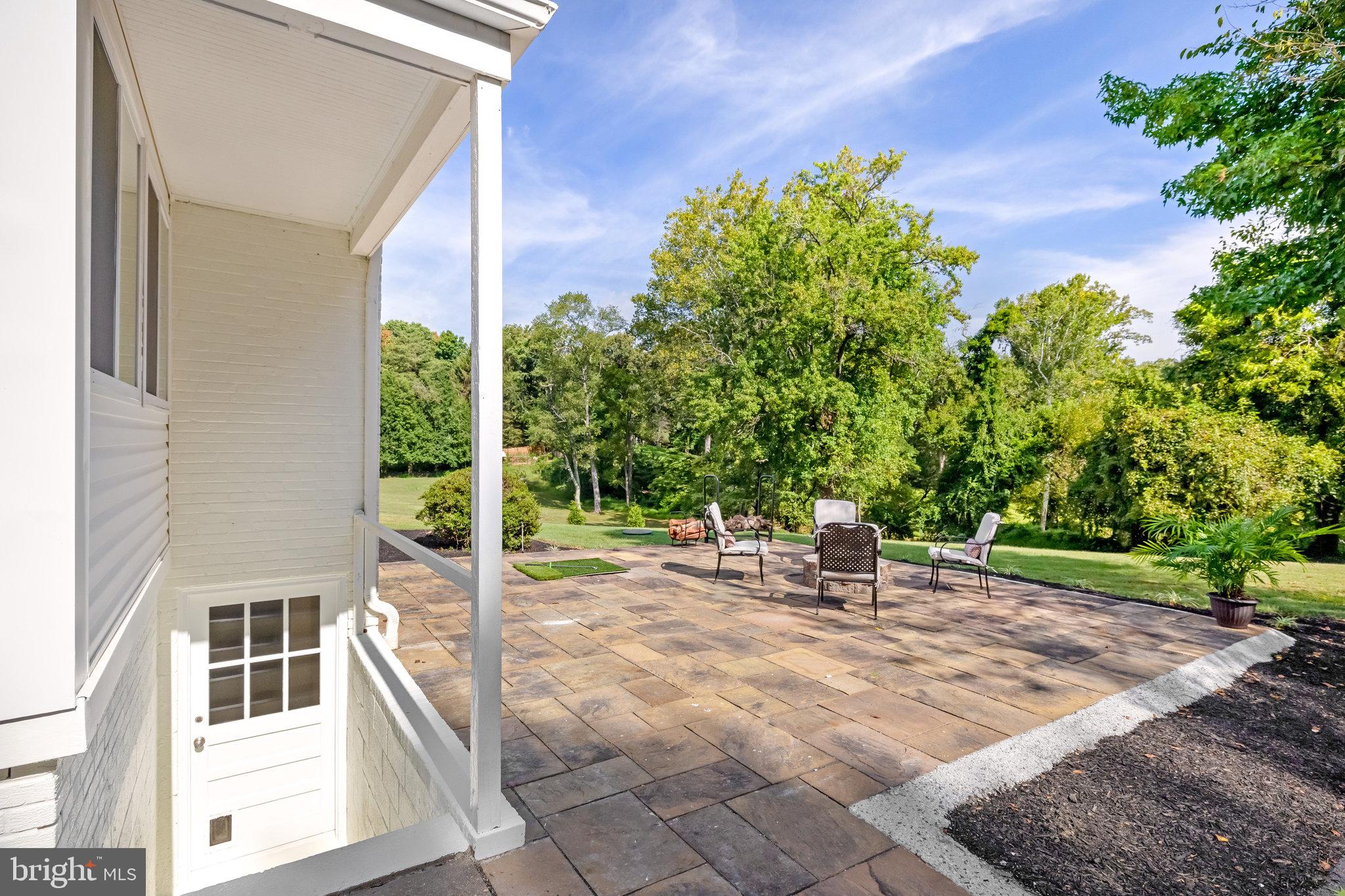 11410 Waples Mill Road Oakton, VA 22124 - Photo 51 of 62 Serene patio with lush greenery.