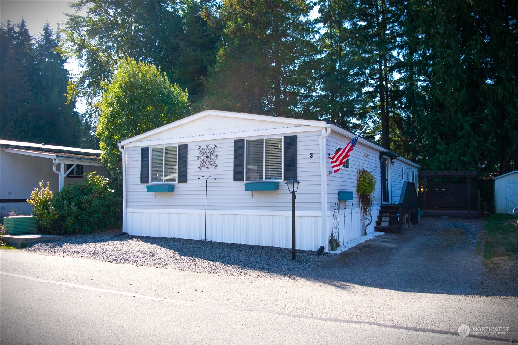 a front view of a house with a garage