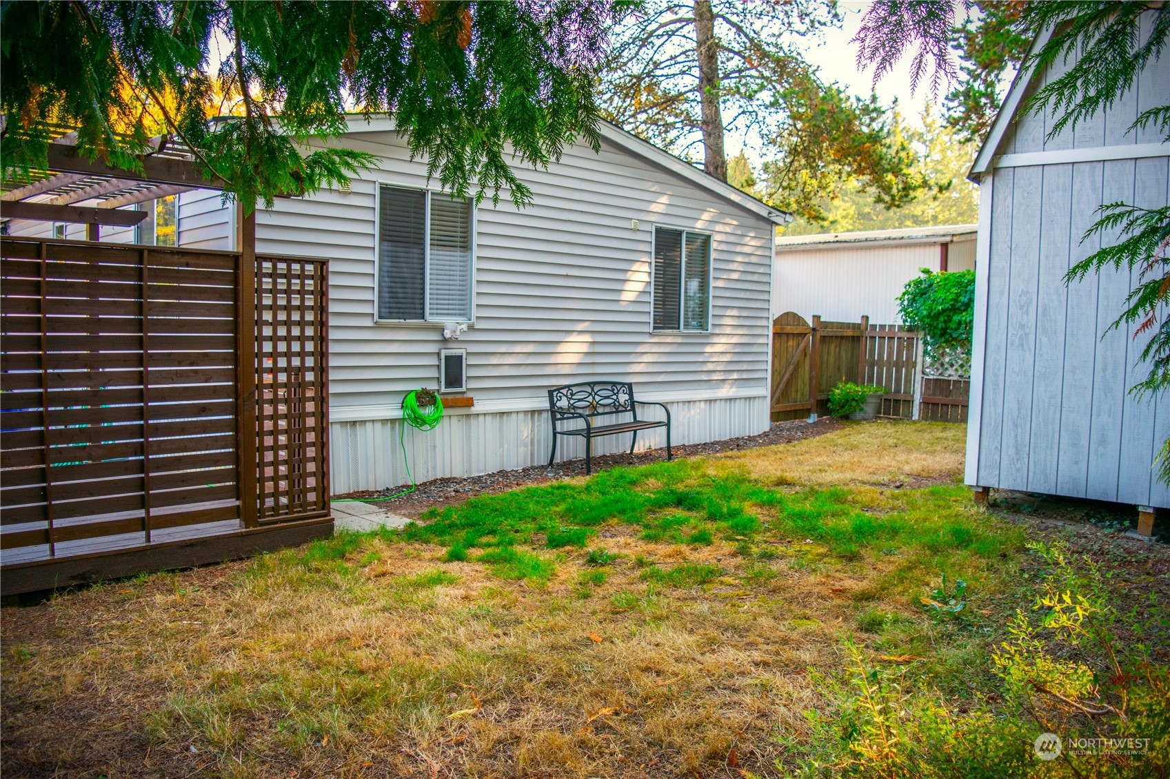 7701 Hardeson Road, Unit 2 Everett, WA 98203 - Photo 19 of 25 a view of a house with a backyard