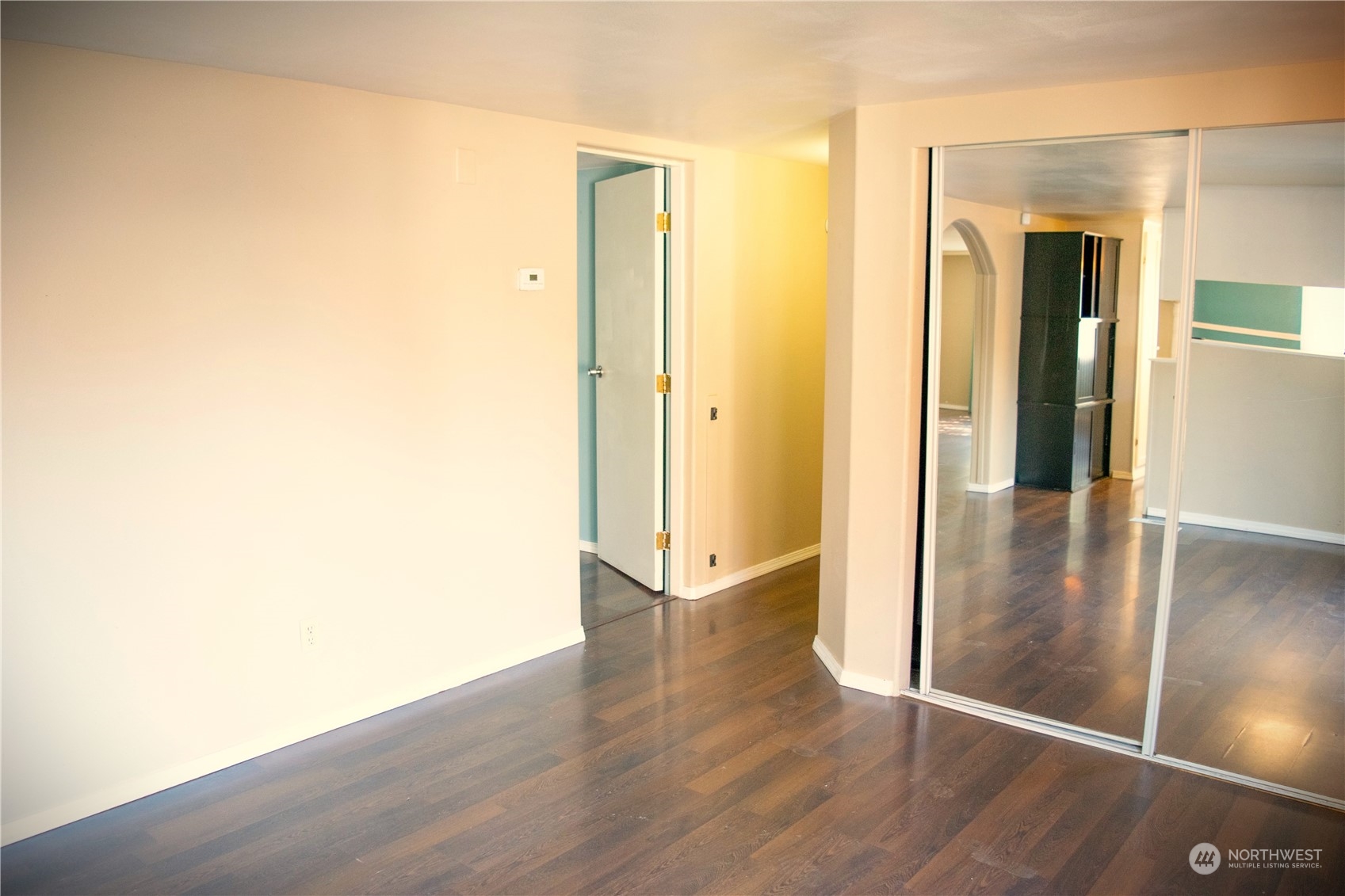 7701 Hardeson Road, Unit 2 Everett, WA 98203 - Photo 7 of 25 a view of a hallway with wooden floor