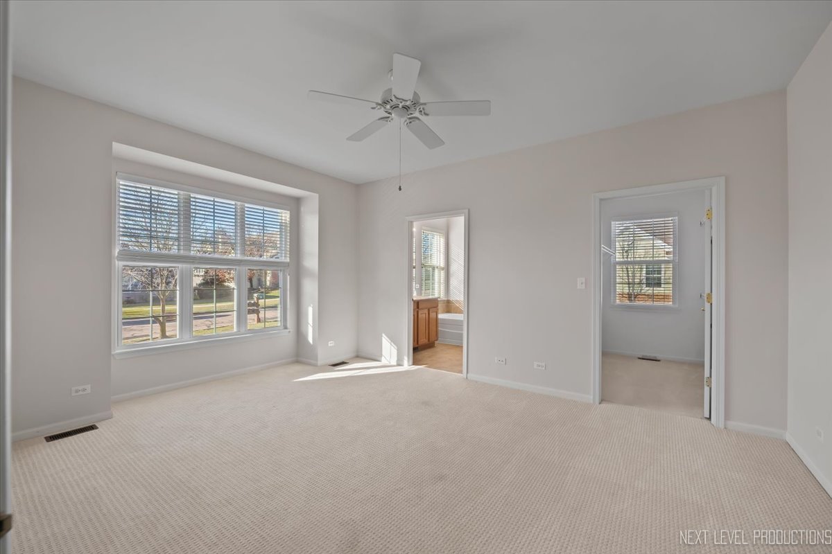 810 Cambridge Drive Batavia, IL 60510 - Photo 21 of 34 a view of an empty room with a window