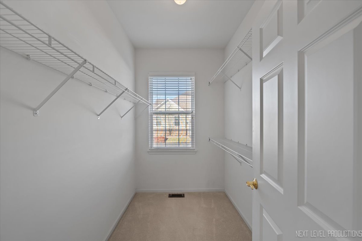 810 Cambridge Drive Batavia, IL 60510 - Photo 25 of 34 a view of room with window and hardwood floor