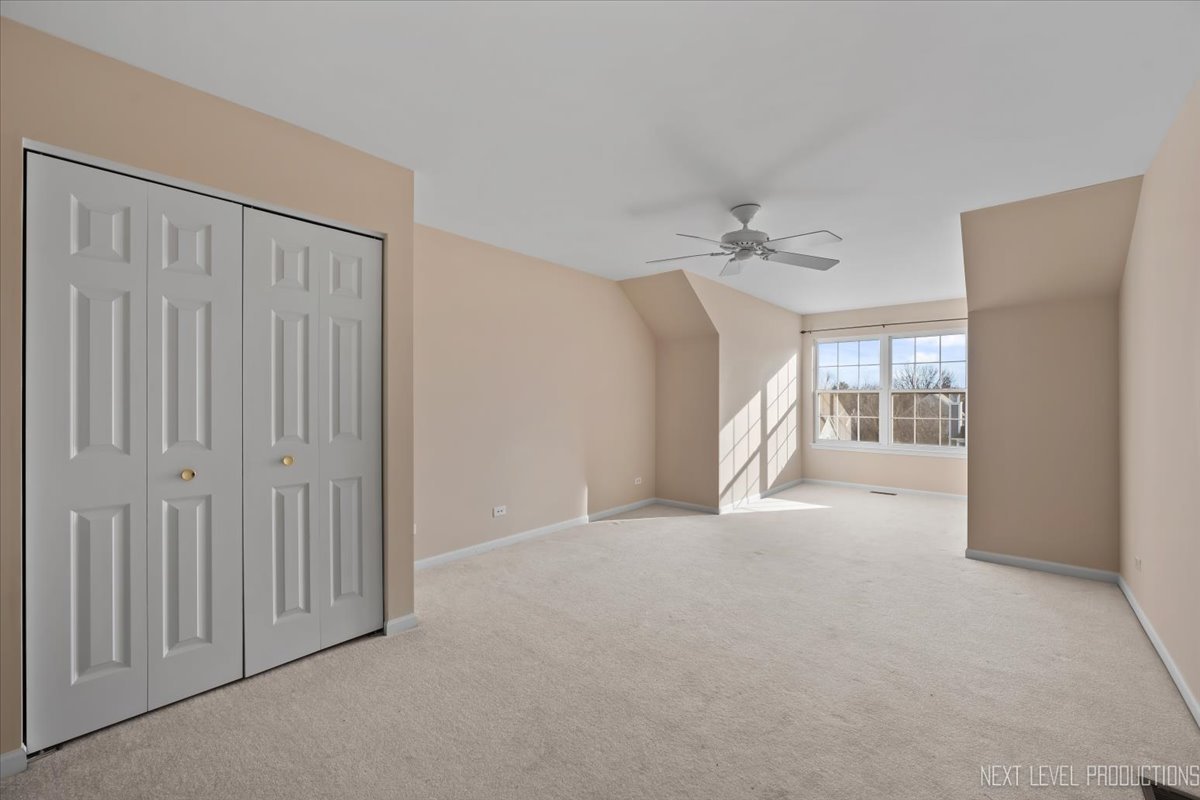 810 Cambridge Drive Batavia, IL 60510 - Photo 28 of 34 a view of a big room with closet and windows