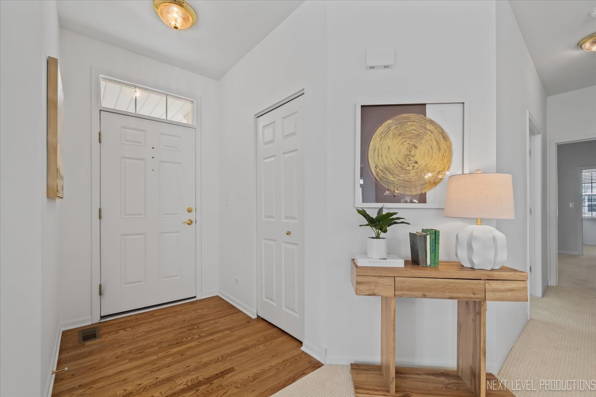 810 Cambridge Drive Batavia, IL 60510 - Photo 3 of 34 a view of room with wooden floor
