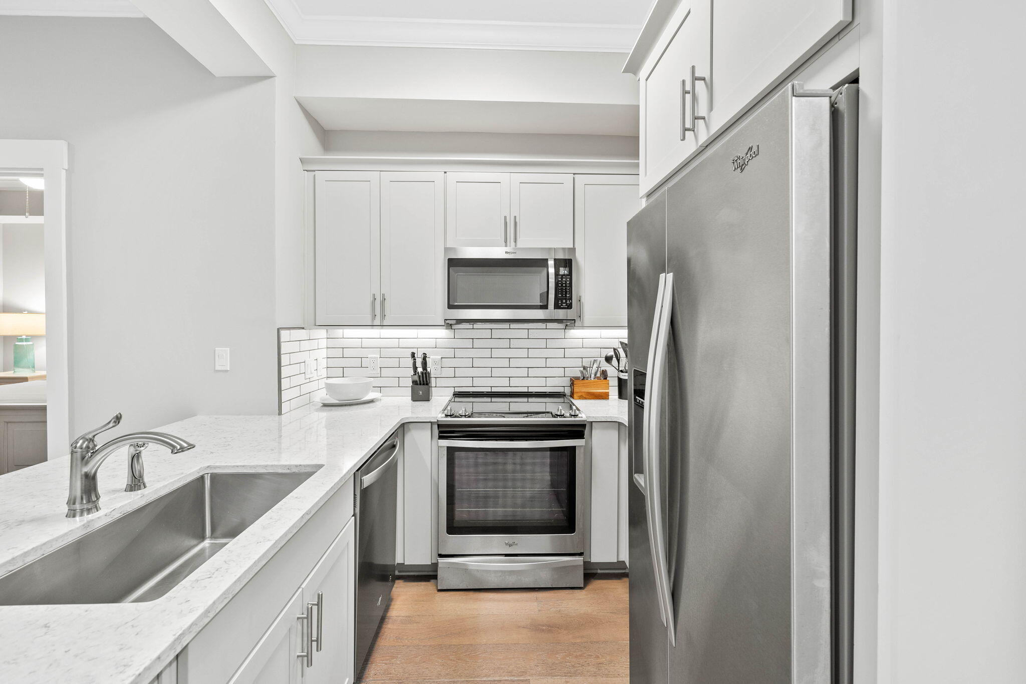 100 Matthew Boulevard, Unit 207 Destin, FL 32541 - Photo 11 of 29 a kitchen with a refrigerator and a sink