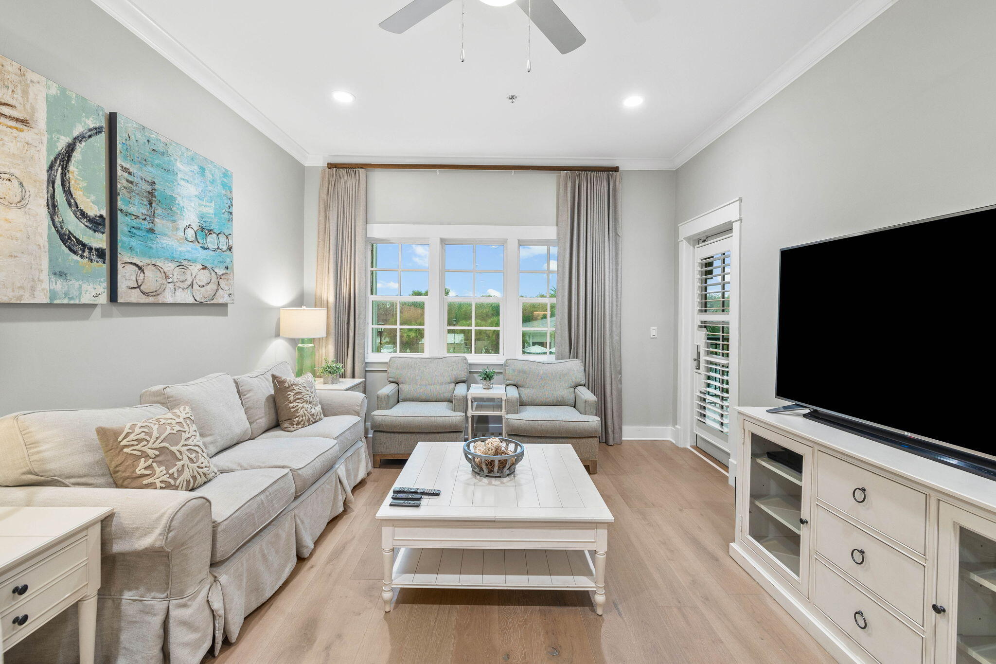 100 Matthew Boulevard, Unit 207 Destin, FL 32541 - Photo 17 of 29 a living room with furniture and a flat screen tv