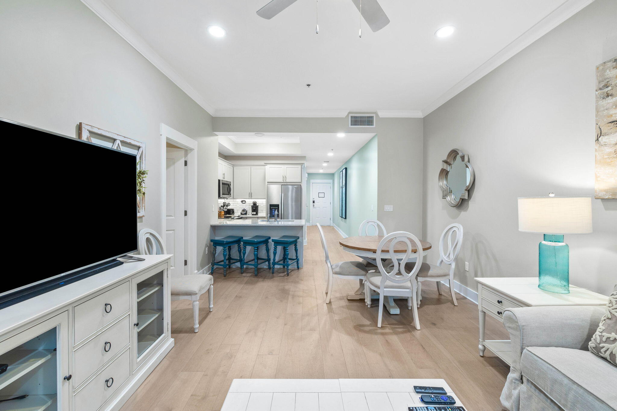 100 Matthew Boulevard, Unit 207 Destin, FL 32541 - Photo 20 of 29 a living room with furniture and a flat screen tv