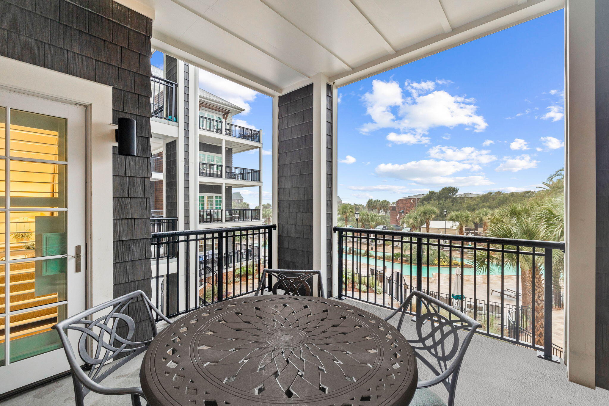 100 Matthew Boulevard, Unit 207 Destin, FL 32541 - Photo 27 of 29 a view of a balcony with furniture