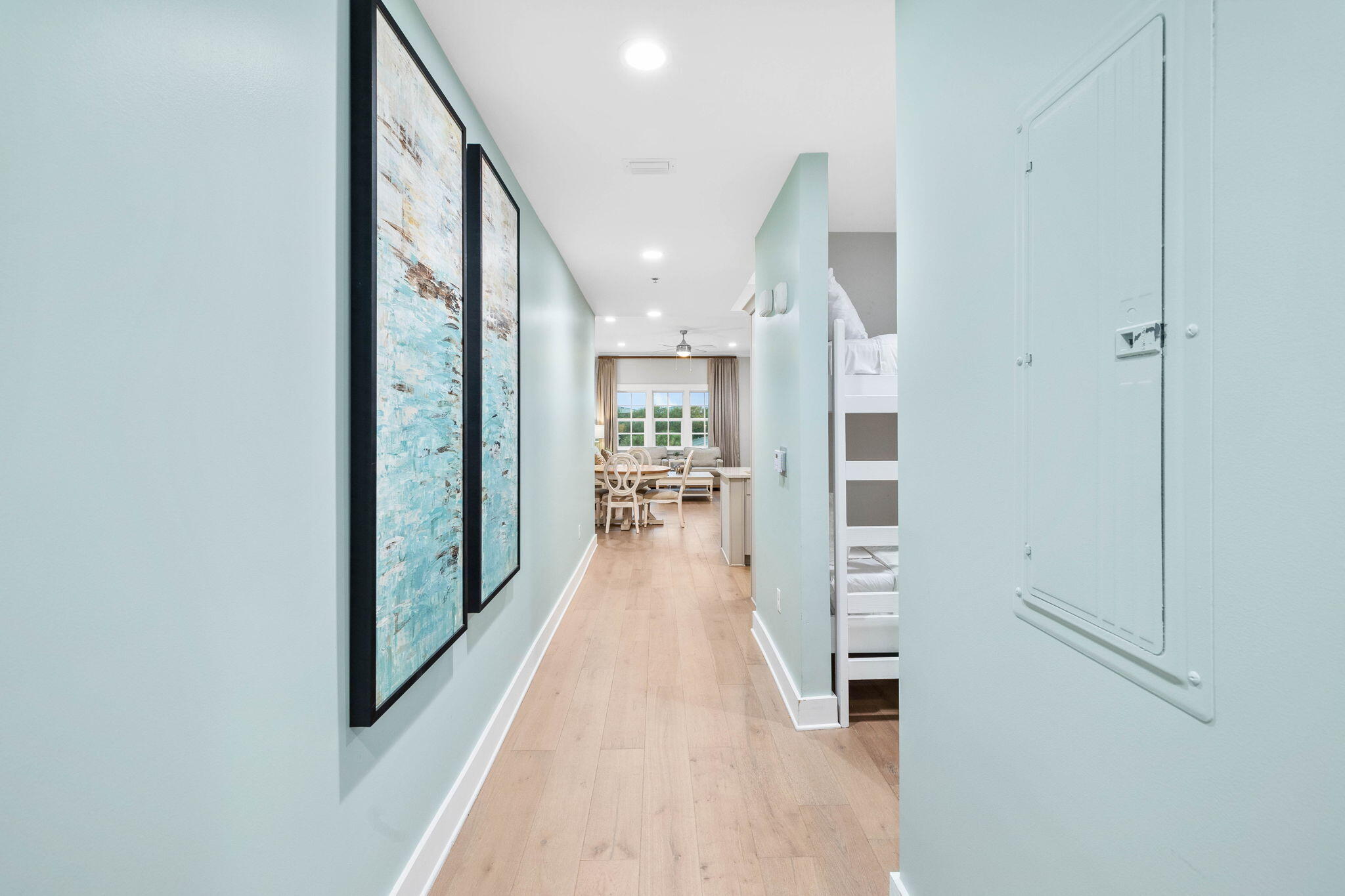 100 Matthew Boulevard, Unit 207 Destin, FL 32541 - Photo 3 of 29 a view of a hallway with wooden floor and staircase