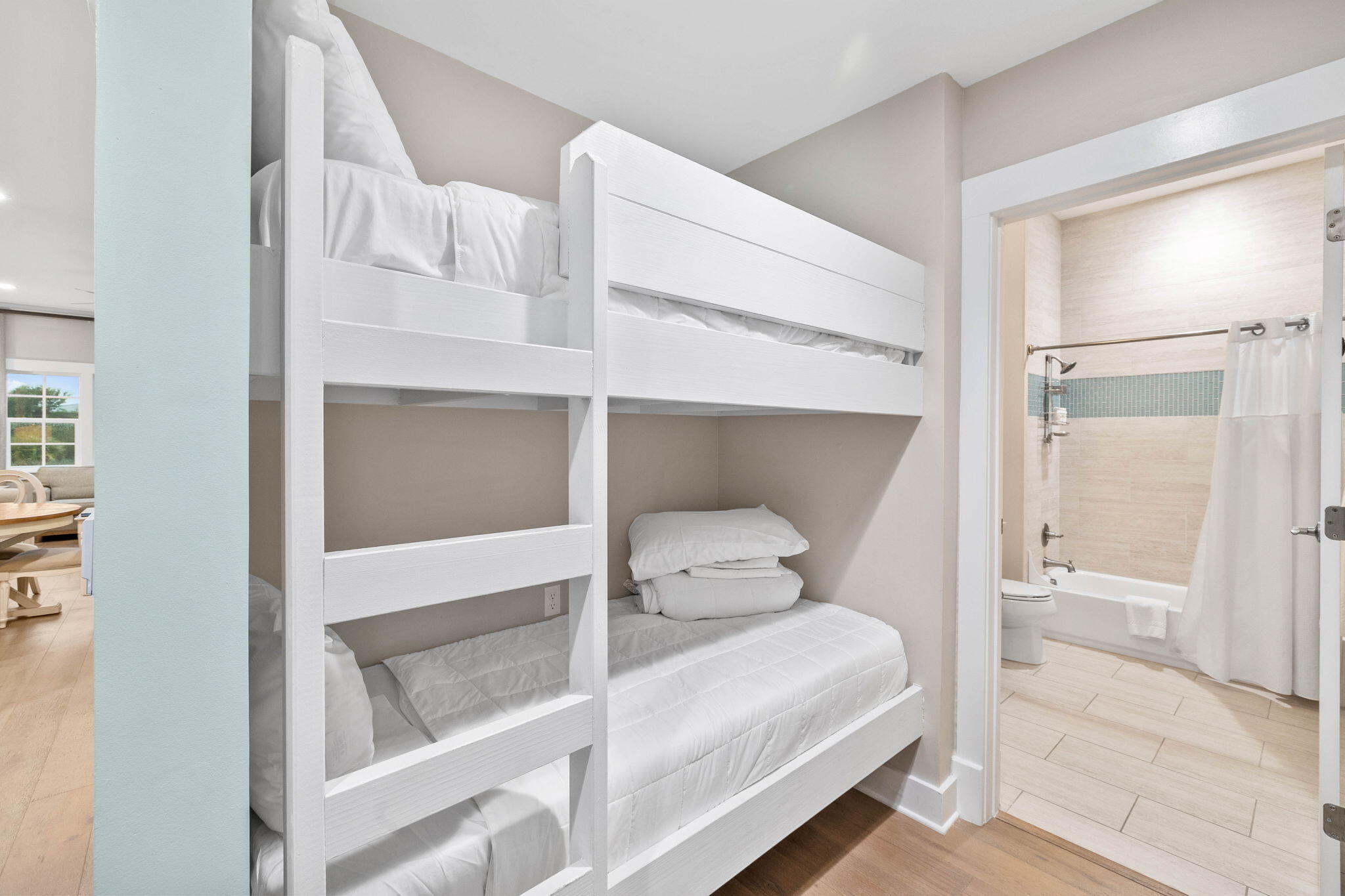 100 Matthew Boulevard, Unit 207 Destin, FL 32541 - Photo 4 of 29 a bedroom with a bed and a view of closet