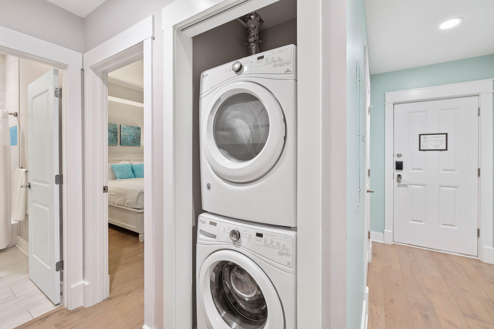 100 Matthew Boulevard, Unit 207 Destin, FL 32541 - Photo 5 of 29 a view of a hallway with washer and dryer