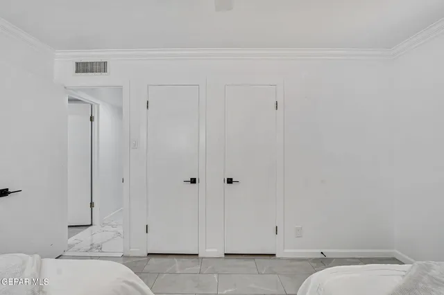 a living room with furniture a window and a table