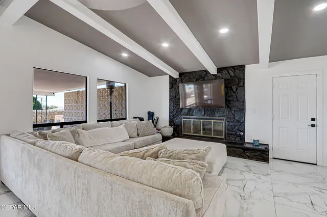 a large white room with kitchen