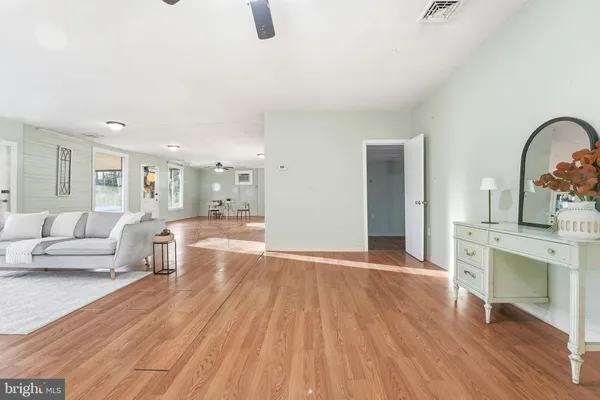 a living room with furniture and a table