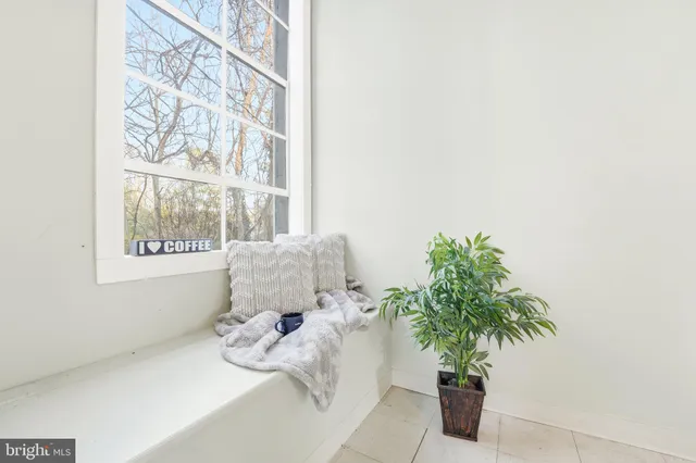 a vase of flowers sitting on a table