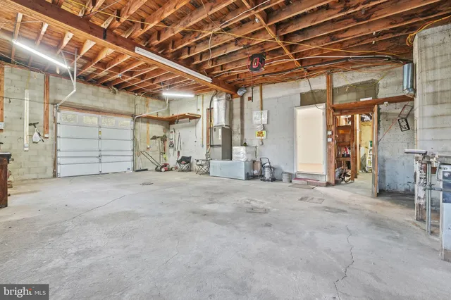 a view of a room with wooden walls
