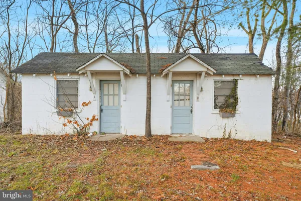 a view of a yard covered in snow