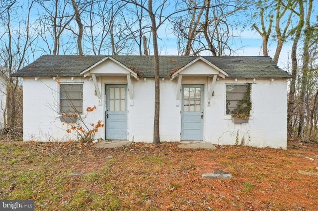 a view of a yard covered in snow