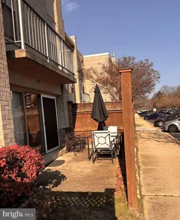a view of a terrace with chairs