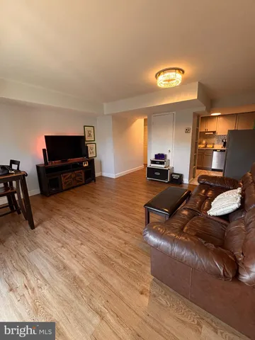 a stove top oven sitting inside of a kitchen