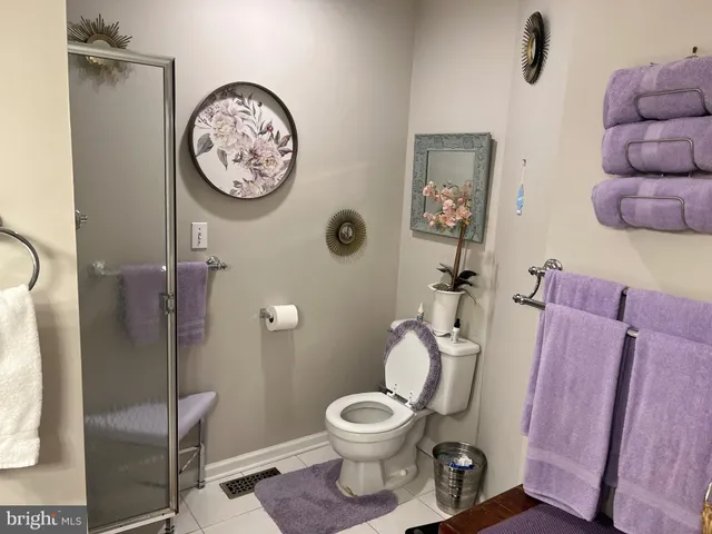 a bathroom with a toilet and a sink