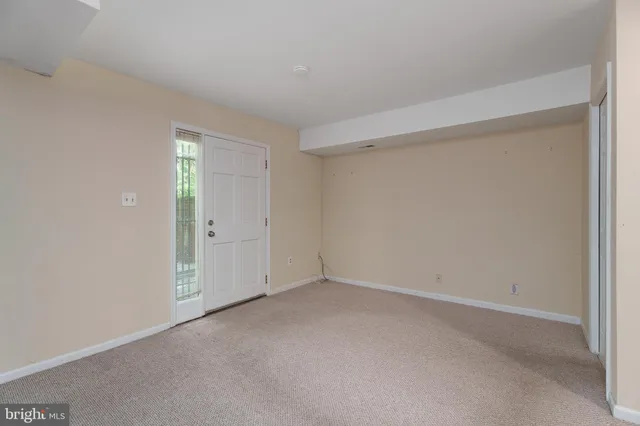 a kitchen that has a sink and a stove