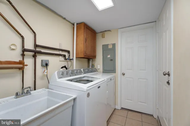 a bathroom with a sink and mirror