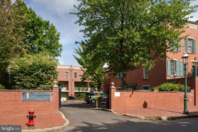 a front view of a house with large windows