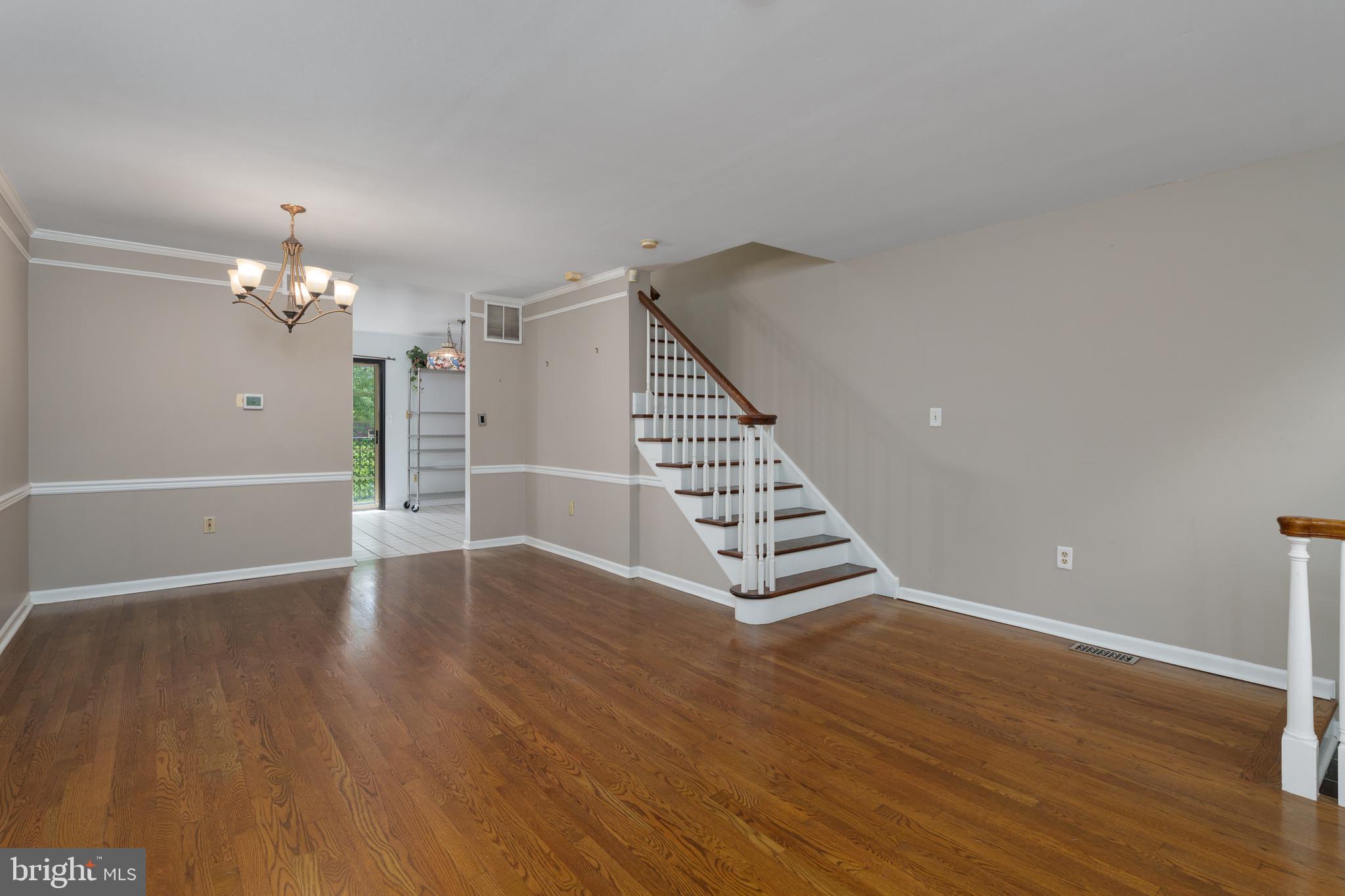190 Mercer Street Trenton, NJ 08611 - Photo 7 of 34 a view of wooden floor and windows in a room