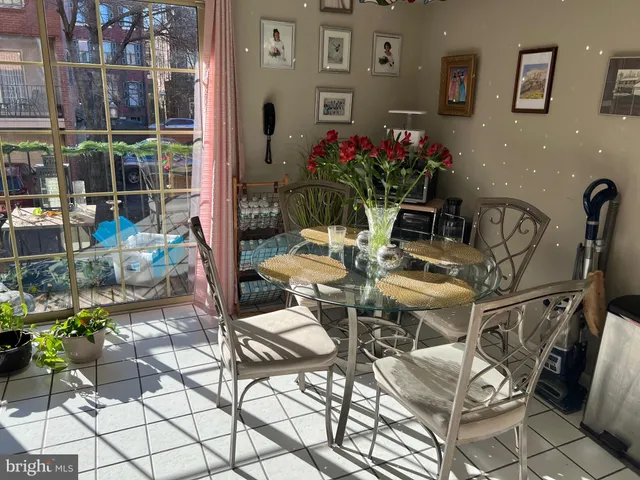 a view of a chairs and table in a patio