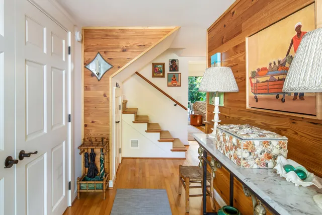 a view of a living room and balcony