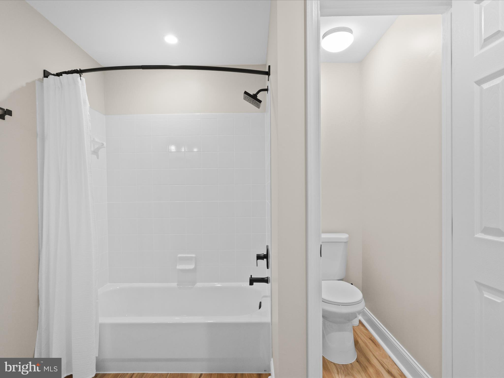 25530 Chilmark Drive Chantilly, VA 20152 - Photo 37 of 67 a bathroom with a shower and a toilet