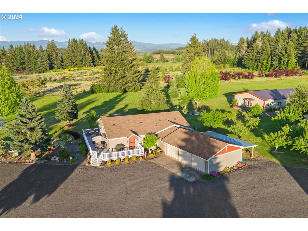 25970 South Wallens Road Estacada, OR 97023 - Photo 1 of 48 a view of a yard with an outdoor space