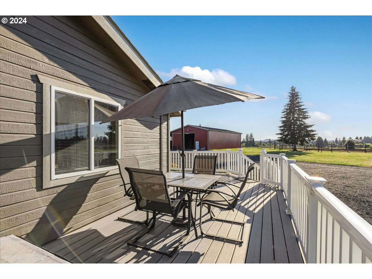 25970 South Wallens Road Estacada, OR 97023 - Photo 18 of 48 a view of a roof deck with furniture